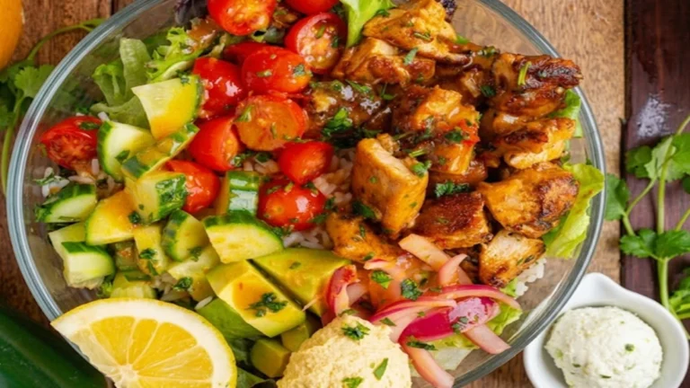 Best Hot Honey Chicken Bowls with grilled chicken, sweet corn, avocado, and creamy sauce served over rice high protein healthy meal prep idea.